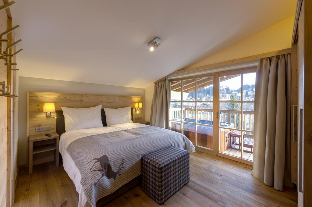 Alpen Chalet Dorfwies Кирхберг Номер фото